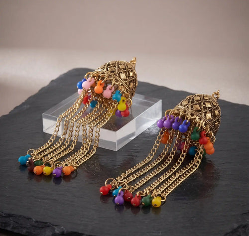 Antique gold carved jhumka earrings with long multi-color bead tassel chains by Trivo Essentials