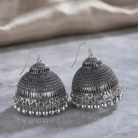 Antique oxidized silver jhumka earrings with textured dome and metallic bead drop details by Trivo Essentials