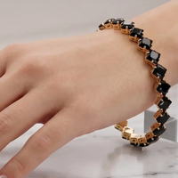 Gold plated tennis bracelet with square princess-cut jet black onyx CZ stones by Trivo Essentials