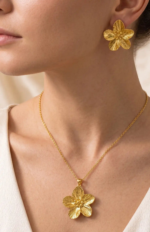 Gold plated 5-petal flower pendant necklace and matching stud tops set by Trivo Essentials
