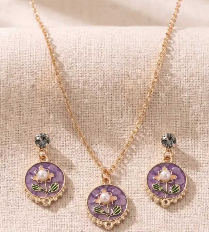 Gold plated purple floral enamel round pendant necklace with matching pearl moti earrings set by Trivo Essentials