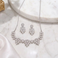 Rhodium silver plated cubic zirconia leaf motif necklace and matching drop earrings bridal set by Trivo Essentials