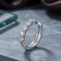 Rhodium silver huggie hoop earrings with clear cubic zirconia stone row by Trivo Essentials
