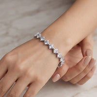 Rhodium silver plated tennis bracelet with square princess-cut clear crystal CZ stones by Trivo Essentials