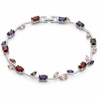Rhodium silver plated tulip bracelet featuring multi-color oval gemstones and champagne leaf accents by Trivo Essentials